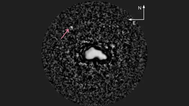 Uma imagem mostrando o asteróide 44 Nysa e sua lua.