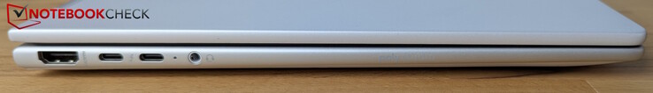Esquerda: HDMI 2.1, 2x Thunderbolt 4 (PD, DP 2.1, HP Sleep and Charge), conector de áudio para fone de ouvido