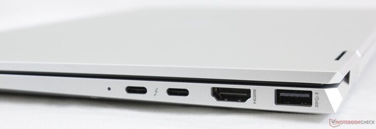 Direita: 2x USB-C c/ Thunderbolt 3 + DisplayPort + Power Delivery, HDMI 1.4b, USB-A 3.1 Gen. 1