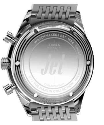 Vista traseira do cronógrafo Timex Marlin Jet, mostrando seu fundo de caixa em aço inoxidável, detalhes em círculos concêntricos, marcações gravadas e o logotipo Jet.