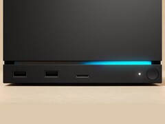Vista frontal da Valve Steam Machine com duas portas USB, uma porta USB-C, um LED de energia, um botão de energia redondo e uma faixa de LED azul. (Fonte da imagem: Valve)