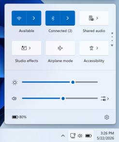 O novo bloco “Áudio compartilhado” no painel de Configurações rápidas do Windows 11.
