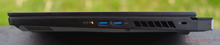 Direita: Luzes indicadoras, 2x USB-A 3.2, trava Kensington