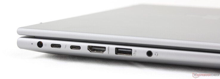Esquerda: Adaptador CA, 2x USB-C Thunderbolt 4 com Power Delivery + DisplayPort 2.1, HDMI 2.1, USB-A (5 Gbps), fone de ouvido de 3,5 mm