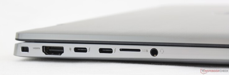 Esquerda: Slot de travamento em cunha, HDMI 2.0, 2x USB-C c/ Thunderbolt 4 + DisplayPort + Power Delivery, leitor MicroSD, conector de áudio de 3,5 mm