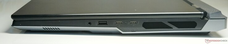 Direita: Conector de áudio combo de 3,5 mm, USB 3.2 Gen2 Tipo A, 2x Thunderbolt 5 (com saída DisplayPort 2.1 e Power Delivery 3.1)