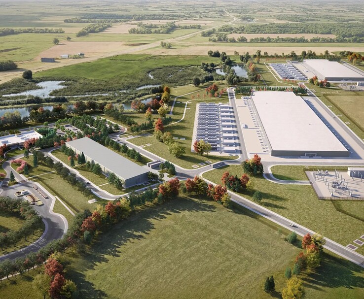 Uma renderização aérea ampla mostrando o data center planejado da Meta em Beaver Dam, Wisconsin, incluindo grandes edifícios de servidores, infraestrutura de resfriamento, campos verdes ao redor, corpos d'água e subestações próximas. (Fonte da imagem: Meta)