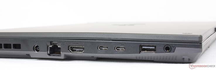 Esquerda: adaptador AC, RJ-45, HDMI 2.0b, 1x USB-C c/ Thunderbolt 4 + DisplayPort 1.4, 1x USB-C c/ DisplayPort 1.4, USB-A 3.2 Gen. 1