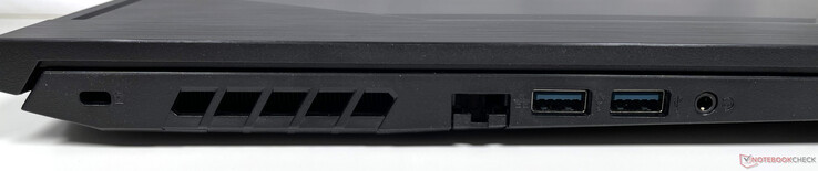 Lado esquerdo: Slot de segurança Kensington, porta Gigabit Ethernet, duas portas USB 3.2 Gen 1 Tipo A, conector combinado fone de ouvido/microfone