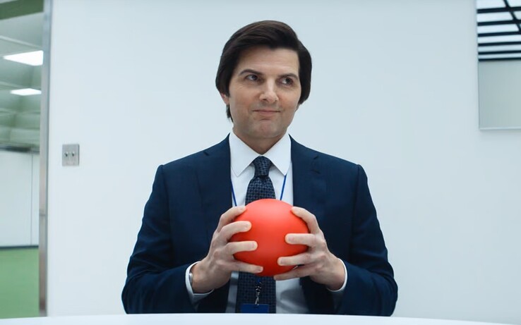 Mark (Adam Scott), de luto pela morte de sua esposa, escolhe o desligamento como uma forma de escapar do luto por metade de sua vida. (Fonte da imagem: Apple TV+)
