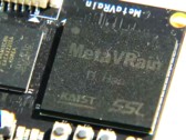 O chip MetaVRain é menor do que uma moeda comum. (Fonte da imagem: YouTube) 