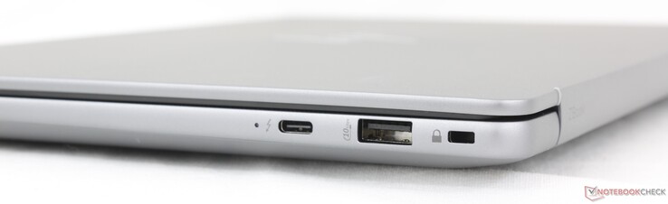 Direito: USB-C (40 Gbps) Thunderbolt 4 com DisplayPort 2.1 + Power Delivery, USB-A (10 Gbps), trava de segurança