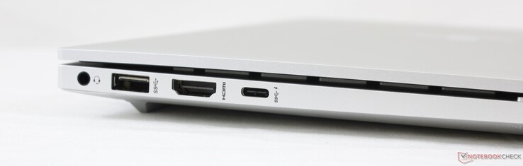 Esquerda: Áudio combinado de 3,5 mm, USB-A 3.1 (5 Gbps), USB-C c/ Thunderbolt 4 (Power Delivery e DisplayPort 1.4)