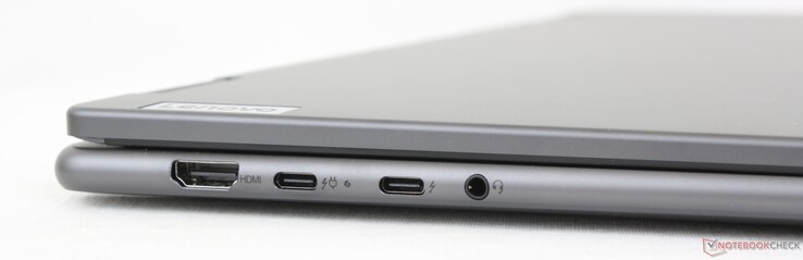 Esquerda: HDMI 2.1 TMDS, 2x USB-C 3.2 com Thunderbolt 4 + DisplayPort 2.1 + Power Delivery 3.1, fone de ouvido de 3,5 mm