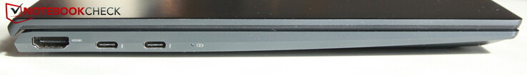 Esquerda: HDMI 2.1, 2x USB-C Thunderbolt 4 incluindo Power Delivery e DisplayPort