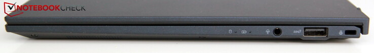 Lado direito: conector de áudio, porta USB-A 3.2 Gen2, fechadura Kensington