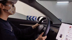 A tela Tesla da Sra. Zheng atuou em uma assustadora coincidência (imagem: Chengdu)