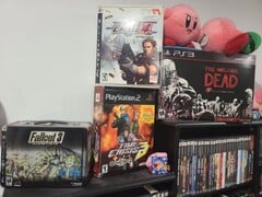 Uma coleção de jogos do PlayStation na foto