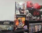 Uma coleção de jogos do PlayStation na foto