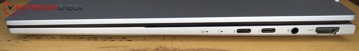 Direita: 2 x Thunderbolt 4, entrada para fone de ouvido, HDMI