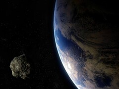 Ilustração de um artista mostrando um asteroide e a Terra. (Fonte da imagem: Batman111 - Pixabay)