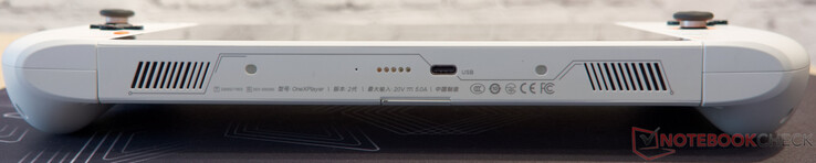 parte inferior: pinos para conectar o teclado, USB C 3.2 com fornecimento de energia e DisplayPort