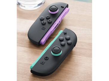 Os novos Joy-Cons têm detalhes em roxo claro e verde claro nos trilhos e joysticks. (Fonte da imagem: Nintendo)