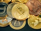 Uma pilha de criptomoedas (Fonte da imagem: Traxer/Unsplash)