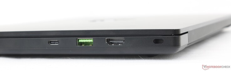 Direito: USB-C 3.2 Gen. 2 com USB4 + DisplayPort 1.4 + Power Delivery, USB-A 3.2 Gen. 2, HDMI 2.1, trava Kensington