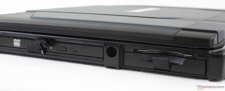 Esquerda: Unidade de DVD removível, recesso do Stylus, bateria removível, leitor de cartão inteligente