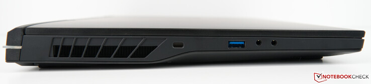 Esquerda: Kensington Lock, USB-A 3.2 Gen 2, entrada de microfone, saída de fone de ouvido