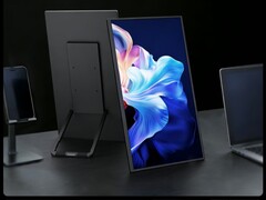 O monitor externo pode ser posicionado de várias maneiras em uma mesa.