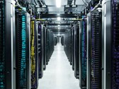 Fileiras de racks de servidores do data center da Meta com cabeamento codificado por cores e sistemas de energia suspensos dentro de uma sala de computação de alta densidade. (Fonte da imagem: Meta)
