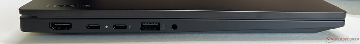 Esquerda: HDMI 2.0, USB-C 3.2 Gen 2 (20 GBit/s, DisplayPort 1.4, Power Delivery 3.1), USB-C 4.0 com Thunderbolt 4 (40 GBit/s, DisplayPort 2.1a, Power Delivery 3.1), USB-A 3.2 Gen 1 (5 GBit/s, alimentado), áudio de 3,5 mm