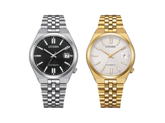 O Citizen NK0030-51E, com mostrador preto, e o NK0032-56A em tom dourado, na foto.