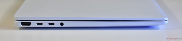 à esquerda: HDMI, 2x Thunderbolt 4, áudio de 3,5 mm