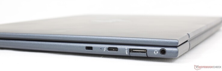 Certo: Slot de travamento Nano, USB-C 4 c/ Thunderbolt 4 + DisplayPort 1.4 + Alimentação, USB-A 5 Gbps, fone de ouvido 3.5 mm