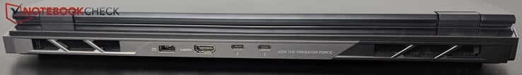 Traseira: Alimentação, HDMI, 2x USB-C TB 5