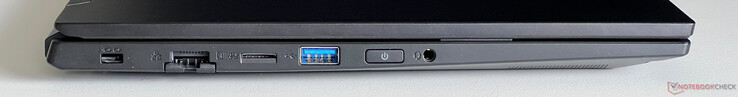 Esquerda: Trava Kensington, Gigabit Ethernet, leitor de cartão microSD, USB-A 3.2 Gen 1 (5 Gbit/s), botão Liga/Desliga, áudio de 3,5 mm