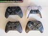 Victrix Pro BFG Reloaded (canto superior esquerdo), DualSense (canto superior direito), controle Xbox Wireless (canto inferior esquerdo), Turtle Beach Stealth Pivot (canto inferior direito)