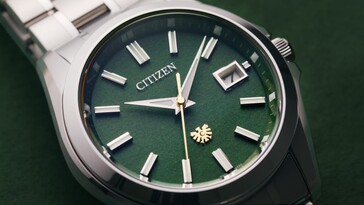 Citizen-AQ4093-56W, mostrador de papel washi verde, foto em close-up.
