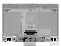 Uma radiografia do novo iMac, cortesia do iFixit, mostra duas placas de metal maciças e minúsculas internas. (Imagem via iFixit)