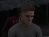 Uma captura de tela mostrando Sir Hans Capon sendo enforcado em Kingdom Come Deliverance 2