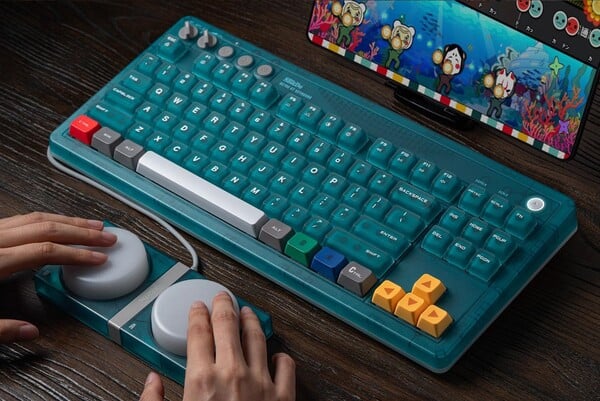 O teclado mecânico Retro 87, edição N64, vem com dois Super Buttons com fio.