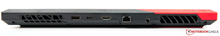 Voltar: Aberturas de ar, 1x USB-A 3.0, USB-C 3.1 com DisplayPort e Power Delivery, HDMI 2.0b, Gigabit LAN, fonte de alimentação, aberturas de ar