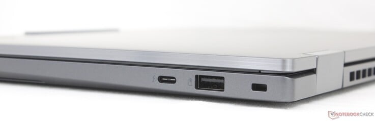 À direita: USB-C Thunderbolt 4 com DisplayPort 2.1 + Power Delivery (65 W), USB-A (5 Gbps), trava Kensington