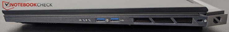 Direita: 2x USB-A (5 Gbps), Kensington