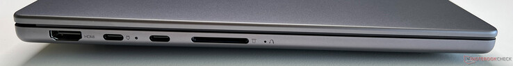 Esquerda: HDMI 2.1, 2x USB-C 4.0 (40 GBit/s, DisplayPort Alt Mode 2.1, Power Delivery 3.0), leitor de cartão SD