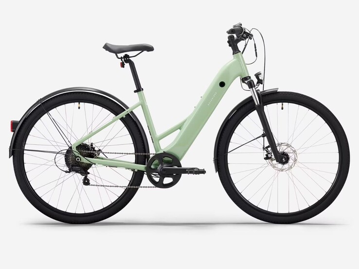 Bicicleta híbrida elétrica de quadro baixo Decathlon Rockrider E-ACTV 100 em verde amêndoa