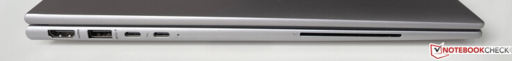 Esquerda: HDMI 2.0, USB-A 3.2 gen 1 (5 Gb/s, alimentação) 2x USB-C c/ Thunderbolt 4 (USB 4, 40 Gb/s, modo DisplayPort ALT 1.4, Alimentação 3.0), leitor de cartão inteligente (opcional)
